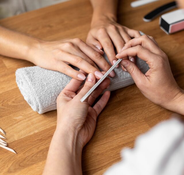 hands-holding-nail-file-close-up