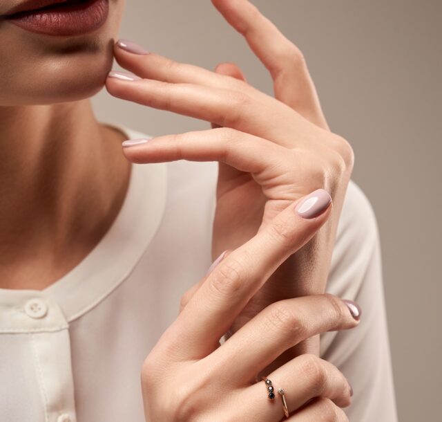 young-model-demonstrating-expensive-ring